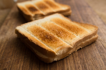Fototapeta na wymiar Fette in cassetta abbrustolito, toasted bread slices