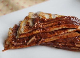 Layered crepe cake with hazelnut and chocolate paste