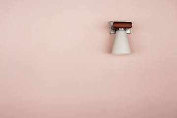 Minimalistic light on pink wall
