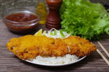 japanese deep fried pork cutlet or tonkatsu with sauce, Japanese cuisine food