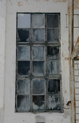 Fototapeta na wymiar Window in old derelict factory