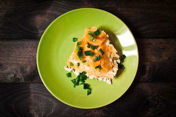 Baked potatoes with melted cheese. Dauphinoise