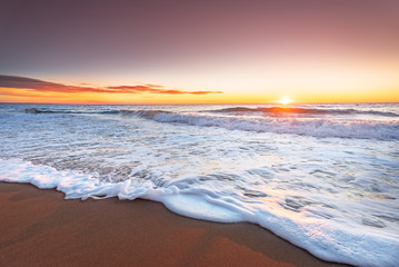 Sunset on the beach of caribbean sea.