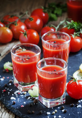 Tomato cocktail with tomatoes, lemon juice, celery, hot pepper a