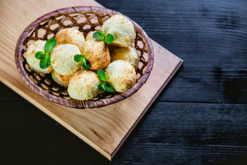 Coconut cookies in a basket, coconut balls, sweet