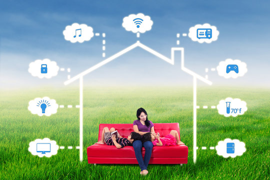 Mother And Children With Smart Home Design