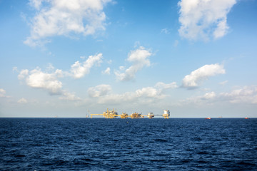 Oil and gas platform in the gulf or the sea, The world energy, Offshore oil and rig construction.