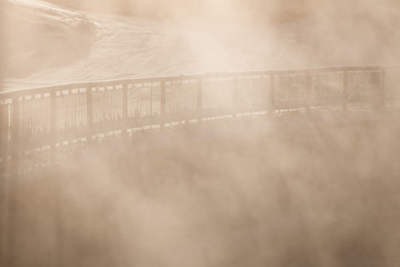 Railing in morning fog