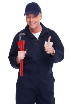Plumber with a wrench.