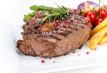 Grilled bbq steak on white background
