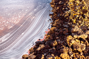 Close-up view on the ocean water on the salt pools on natural manufacturing on La Palma island in Spain