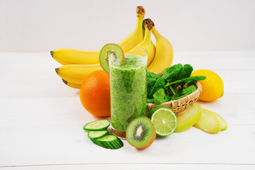 Green smoothie made with kiwi, spinach  and banana