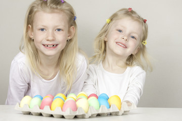 little girls with Easter eggs