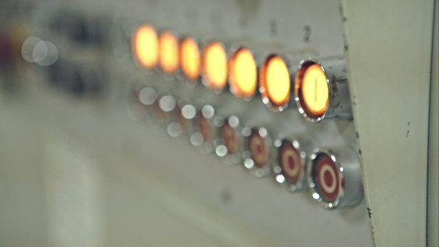 The old operating control panel with yellow buttons. RAW video record.