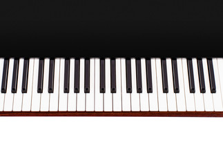 Top view of keyboard of an electronic piano in black casing on white background