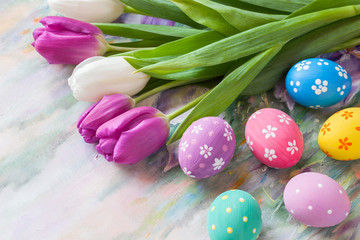 Obraz na płótnie Canvas Tulips and colorful eggs