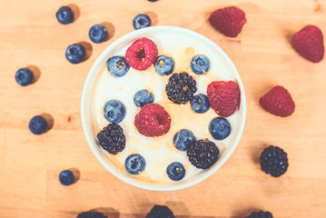 Bowl of yogurt and berries from above