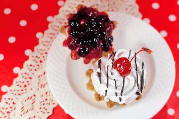 Two cakes on a porcelain plate