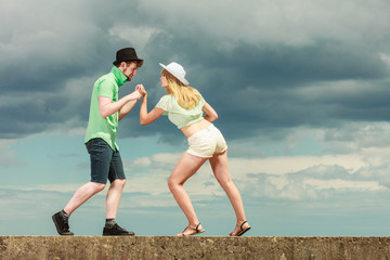 Fototapeta na wymiar hipster couple in love playing fighting outdoor