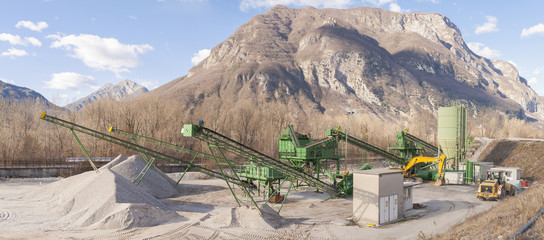 Gravel extraction plant.  
Machinery and classification according gravel size distribution via...