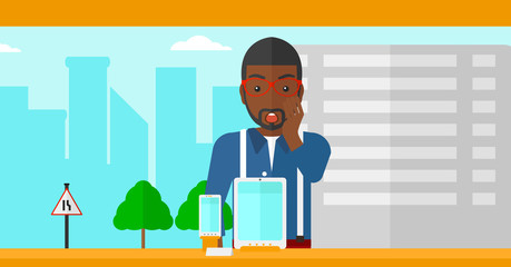 Man looking at shop window.