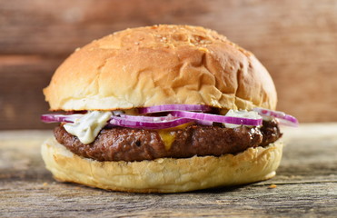 Gourmet bacon cheeseburger with onion