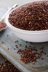 healthy uncooked red quinoa in dish