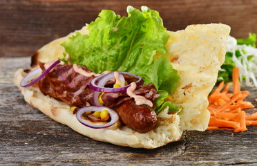 Homemade Bacon Wrapped Hot Dogs with Onions and Peppers