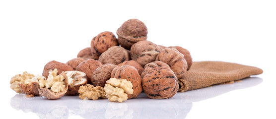 Fresh walnuts on burlap