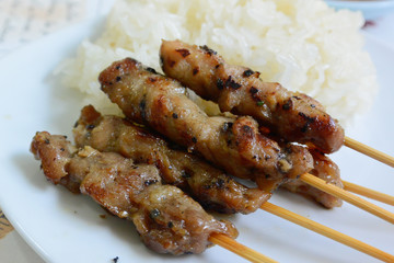 Grilled pork with sticky rice