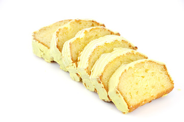 close up on fresh cakes sliced in rows