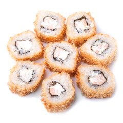 Deep fried japanese tempura roll with salmon, unagi sauce, sesame, cream cheese and crispy breading - isolated in white background