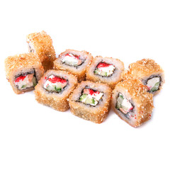 Deep fried japanese tempura roll with salmon, red caviar masago,cucumber, cream cheese and crispy breading - isolated in white background