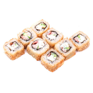Deep fried japanese tempura roll with tuna, sea scallop,cucumber and cream cheese and crispy breading - isolated in white background