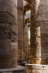 A sandstone column in Egypt.  columns covered in hieroglyphics