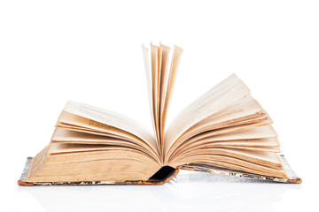 Old book open isolated on white background