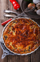 Pie quiche with mushrooms.selective focus.