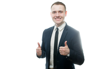 Young smiling businessman with thumb up with two hands