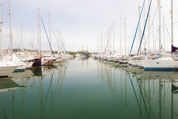 White boats and yachts in the quay