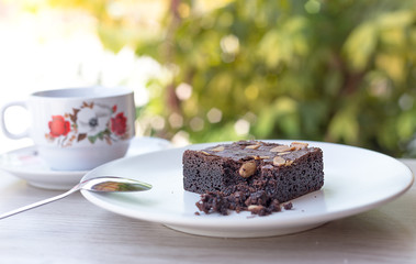 brownies stacked on a plate.