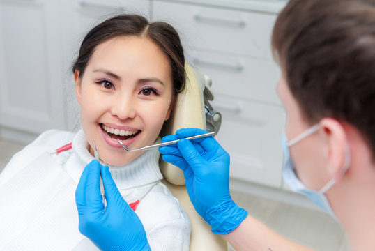 Young female patient at dentist office