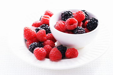 raspberries and black berries. fresh berries