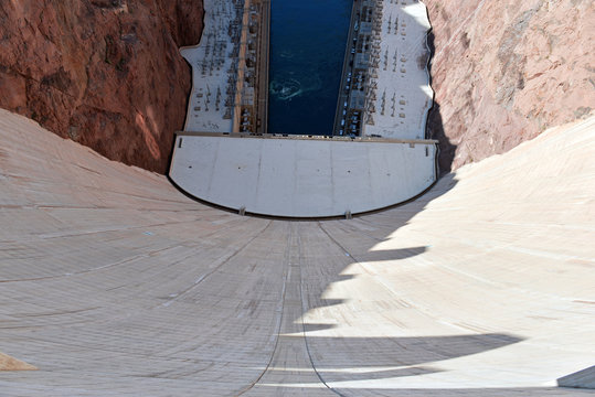 Hoover Dam, a massive hydroelectric engineering landmark located on the Nevada and Arizona border built to harness power from the Colorado River, is a top tourist attraction from Las Vegas