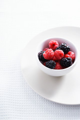 raspberries and black berries. fresh berries