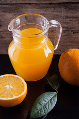 Obraz na płótnie Canvas orange juice in the pitcher