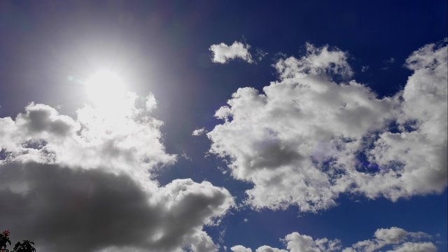Time lapse of clouds making a feeling of happiness  as the sun breaks through