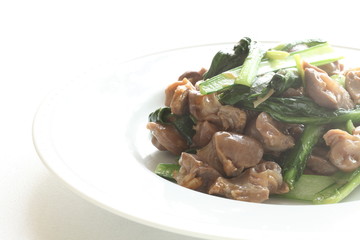Chinese food, gizzard and Komatsuna green leaf vegetable stir fried