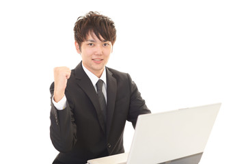 ガッツポーズのビジネスマン