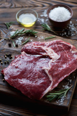 Close-up of fresh uncooked rancho beef steak with seasonings