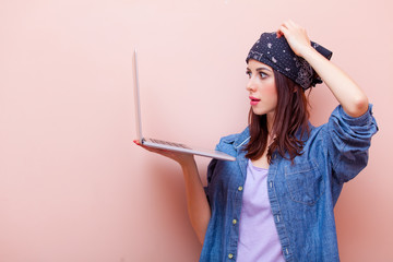portrait of a young woman with laptop